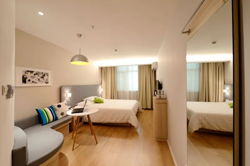Neatly made bed in a clean bedroom